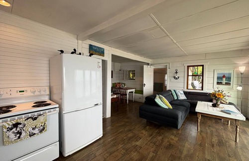 Lion's Head House | Seafari is a charming stone cottage on Georgian Bay with stunning bluff views, a flat rock shoreline, and a cozy bunkie. Perfect for relaxing, swimming, and exploring.