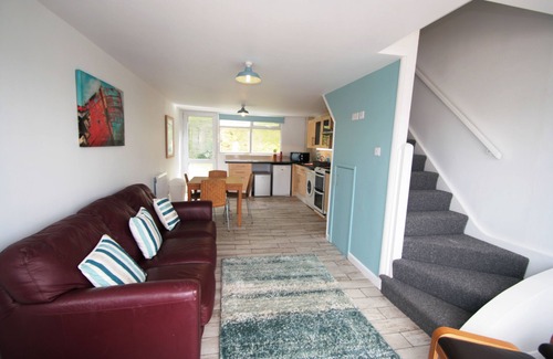 Pembroke Cottage | 'Seahorse' - a Holiday Home with Balcony, Patio and Sea View