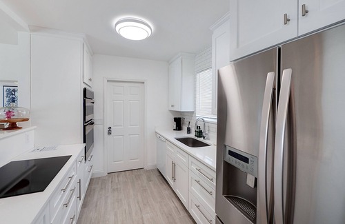 Singer Island Condo | Seas the Day 8: Designer beach retreat with pool & hot tub - walk to the beach