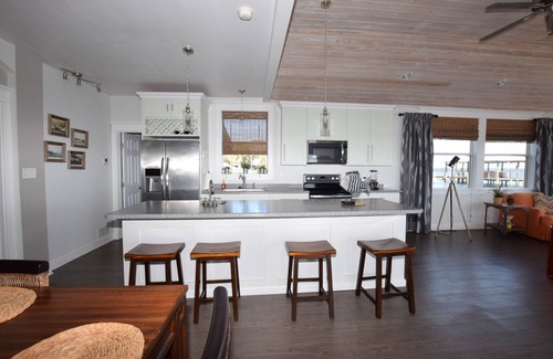 Crescent City Cottage | Seas the Day Cottage is built over the water for fantastic fishing & lake views.