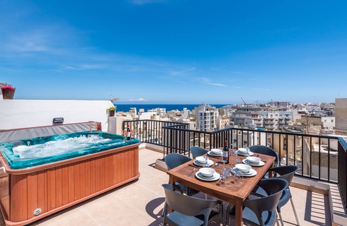 Bugibba Apartment | Seashells Penthouse Hot Tub Seaview by Getaways Malta