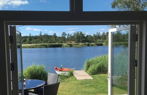 Tofta Cabin | Seaside cottage with private lake plot, jetty and boat