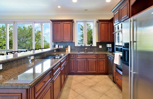 Key West House | Seaside Retreat: Waterfront Home with private heated pool & lush landscaping