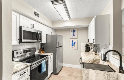 Indian Bayou Apartment | Seaside Serenity Near Beach with Pool, Gym, Balcony