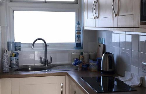 West Bay Apartment | Seaside Studio right on the coastal path.