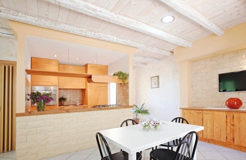 Chia Villa | Seaside villa with garden and panoramic mountain views.