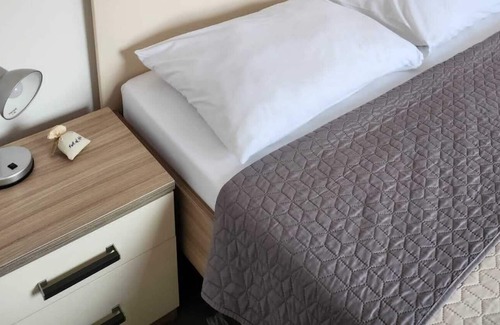 Gospic Apartment | Seaview 2-room apartment just steps away from the beach, shops and restaurants
