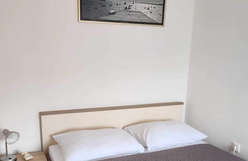 Gospic Apartment | Seaview 2-room apartment just steps away from the beach, shops and restaurants