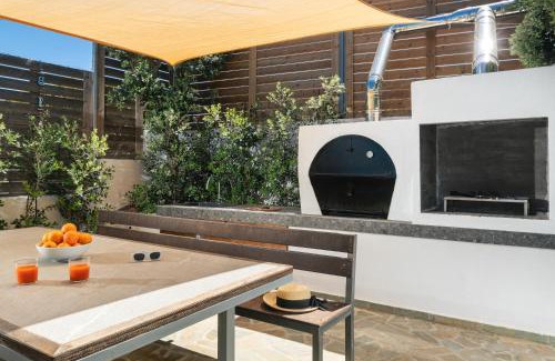 Kato Stalos Villa | Seaview Garden Villa - Heated Pool & Sauna