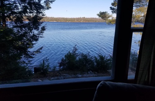 Eagle River House | Secluded 2 acre Lakefront Home with boat and motor included on 5 lake chain.