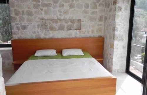 Uzunyurt House | SECLUDED DESIGN STONE HOUSE WITH SEAVIEW