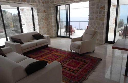 Uzunyurt House | SECLUDED DESIGN STONE HOUSE WITH SEAVIEW
