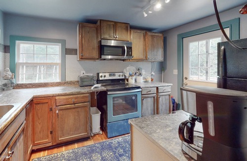 North Troy Cabin | Secluded, dog-friendly cabin with a deck, large yard, firepit, & wood stove