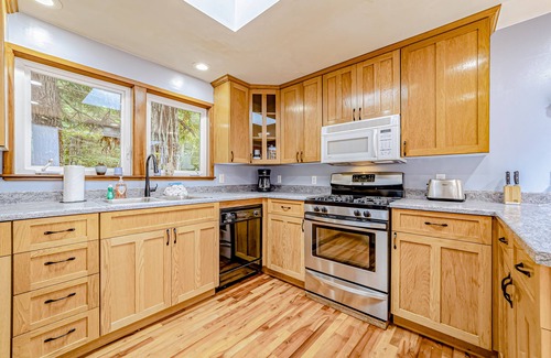 Trinidad House | Secluded forest home with deck, private setting, woodstove, WiFi, & patio
