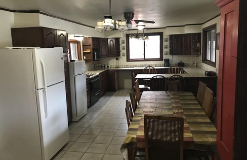 Rapid River Cabin | SECLUDED LODGE WITH ONE OF THE LARGEST PRIVATE STOCKED LAKES IN MICHIGAN.