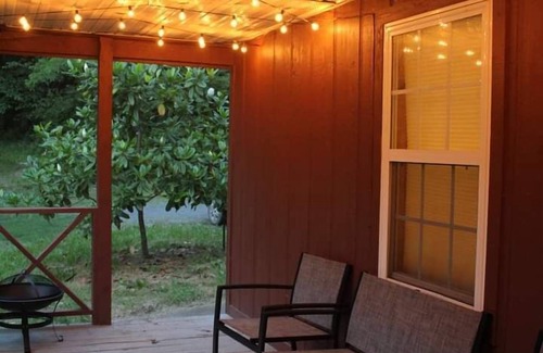 Marshall House | Secluded Magnolia Cabin & Hot Tub
