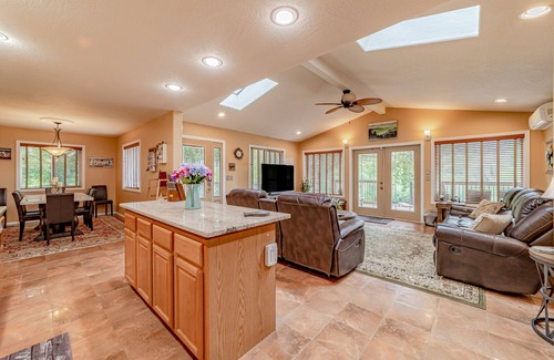 Crescent City House | Secluded riverfront getaway with firepit, deck, washer/dryer, & free WiFi