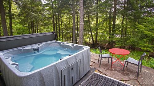 Margaretville House | Secluded Streamside Home with Hot Tub