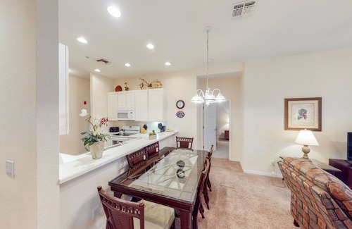 Bahama Bay Condo | Second-floor condo with basketball court, tennis court, sauna, restaurant, pools