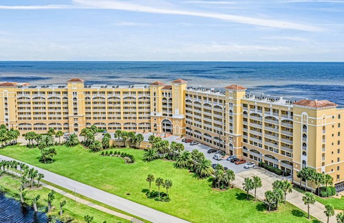 Palm Coast Condo | Second floor oceanfront condo with pool & hot tub, central AC, and washer/dryer