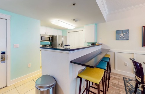 Fort Walton Beach Condo | Second floor beachfront condo with pool and hot tub access, W/D, and central AC