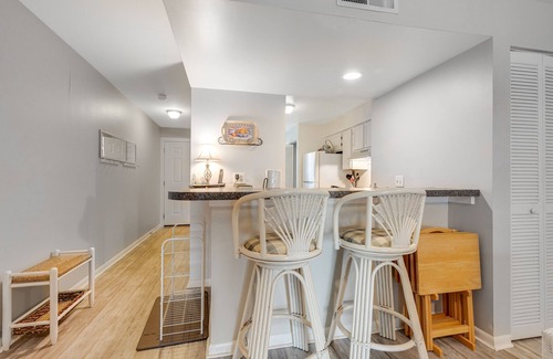 Folly Beach Villa | Second-floor villa w/river views & community pool, tennis courts, and dock