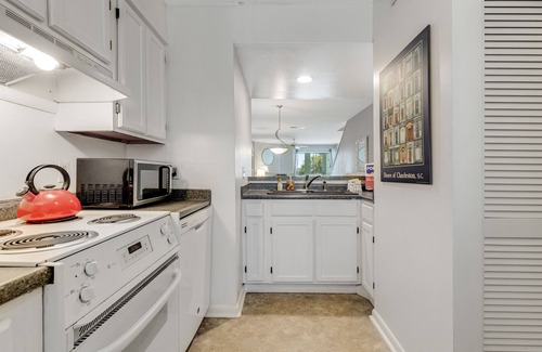 Folly Beach Villa | Second-floor villa w/river views & community pool, tennis courts, and dock