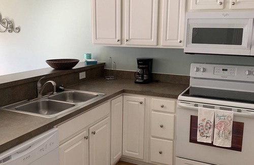 Surfside Beach House | SECOND ROW. Pool, covered parking, wifi. Monthly rates for fall, winter months.