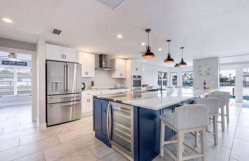 Pelican House | Seconds to River Direct Gulf Access Pool/Spa Home With Games Room