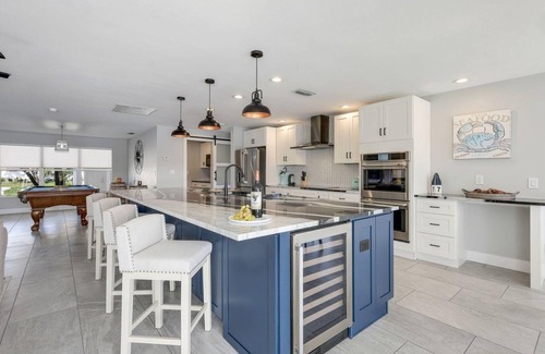 Pelican House | Seconds to River Direct Gulf Access Pool/Spa Home With Games Room
