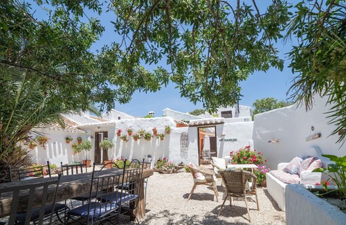 Villanueva del Trabuco Apartment | Secret garden rock pool retreat vacation home with shared pool and WiFi