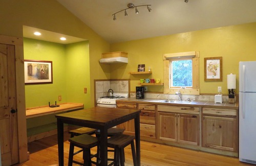 Whitefish Cottage | Secret Garden, king bed Cottage