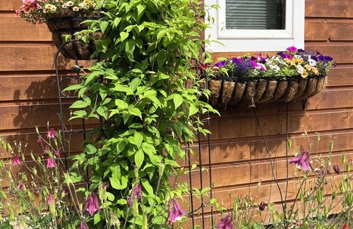 Whitefish Cottage | Secret Garden, king bed Cottage