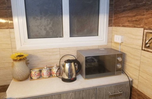 Madinaty Apartment | Secure : Handcrafted Furniture with garden view 22 minutes to the airport