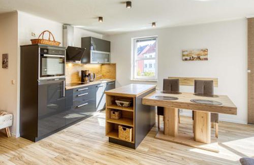 Muritz Apartment | Seemöwe - Moderne Ferienwohnung mit Balkon