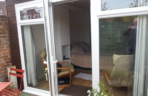 Bridport Cabin | Self Contained Garden Studio With Private Decked Terrace, close to town and sea