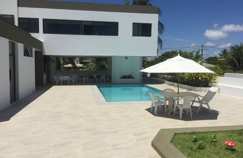 Canto do Mar House | Sensational beachfront home in the best condo in Guarajuba with large pool