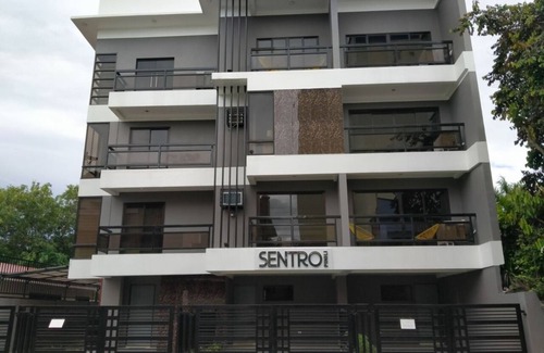 Dumaguete Apartment | Sentro Pinili is 5 minutes away from Rizal Boulevard and 20 minutes from the Sibulan airport