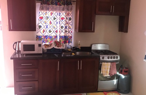 Portmore Apartment | Serene 1 Bedroom Apt with Pool, Pergola & Cabana E9