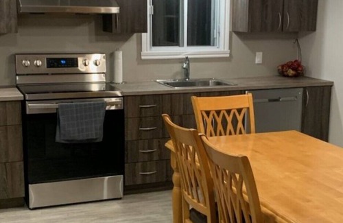 Notre-Dame-de-Pontmain Cottage | Serene waterfront 4 bdrm/2 bath cottage with wifi/hot tub/deck/bbq/firepit/dock