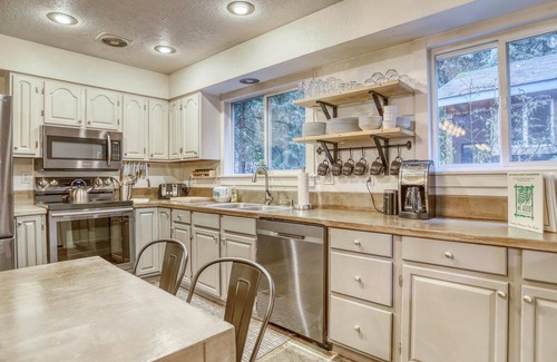 Rhododendron Cabin | Serene Hearthstone Retreat with fireplace, hot tub, BBQ, dog-friendly