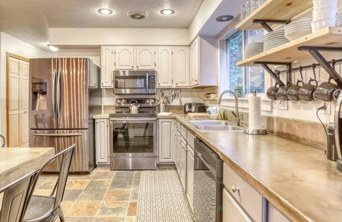 Rhododendron Cabin | Serene Hearthstone Retreat with fireplace, hot tub, BBQ, dog-friendly