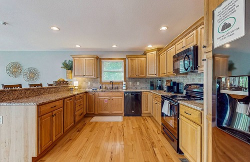 Caryville House | Serene home with private dock, waterslide & fully equipped kitchen