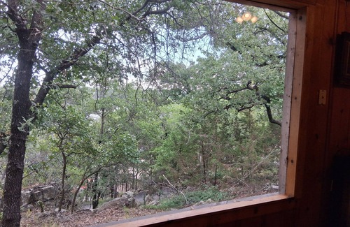 Gordon Cottage | Serene lake front cabin set on bluff overlooking Palo Pinto lake.