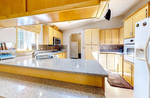 Bremerton House | Serene & secluded home with a large yard, deck, grill, jetted tub, W/D, and AC