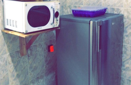 Agblangandan House | SereneLux Home Cozy 1-bedroom apartment in nice Cotonou with AC, WiFi