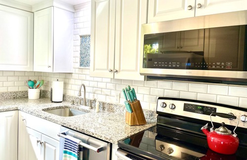 Rehoboth by the Sea Cottage | Serenity Amid it All. Dog friendly PET FEE, WiFi, outdoor shower, grill