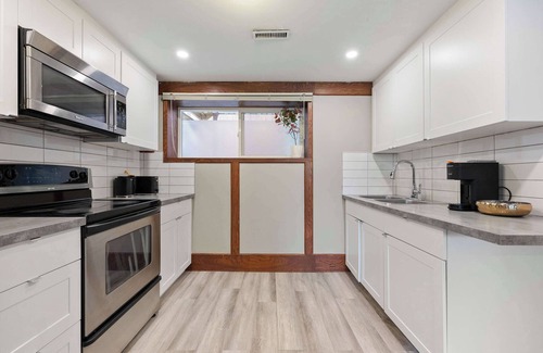 Northwest Calgary House | Serenity by the Green: Yoga, Near Championship Golf - 2BR, FREE Banff Pass