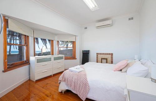 Largs North House | Serenity by the Sea - 4BR Home with beach views