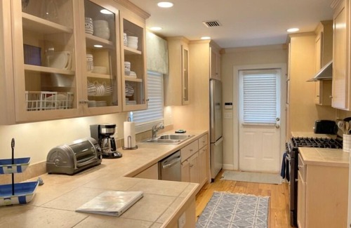 Saint Simons Island House | Serenity Now! This is the house you have been looking for with a HUGE porch!